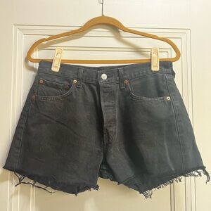 Distressed black denim Levi shorts